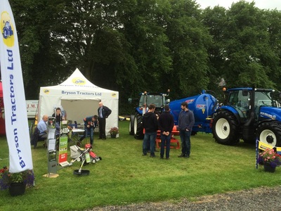 Bryson Tractors 4x4m pop-up gazebo in white with printing at an agricultural show
