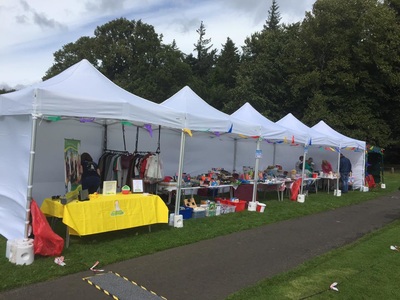 Outdoor pop up stalls on a summer fundraising event